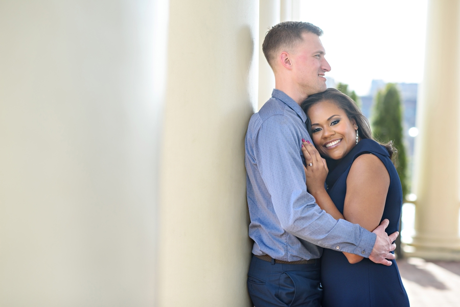 A bride to be cuddles up to her man at the Waterworks in Philadelphia.